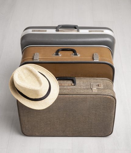 suitcases-travel-with-straw-hat